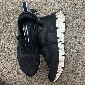 Reebok black/cheetah print shoes